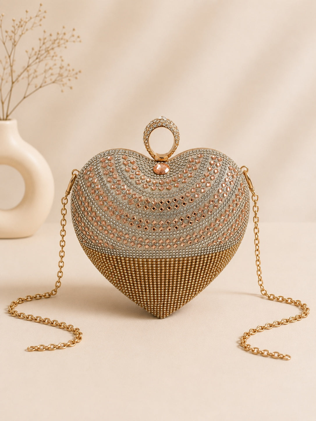 Model wearing bridal reception heart evening handbag