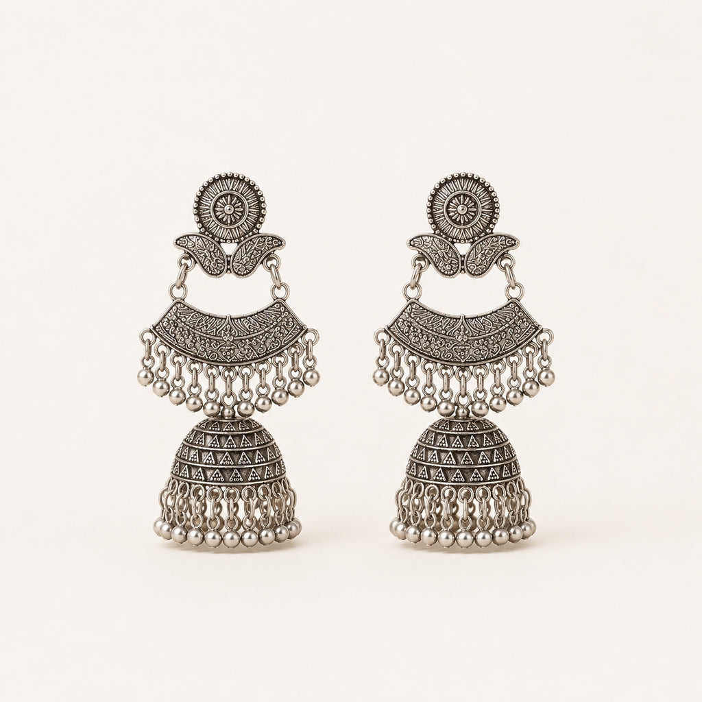 Oxidised silver double decker jhumka earrings on white background