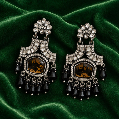 Black antique chandelier earrings on green velvet - Velvet Petals