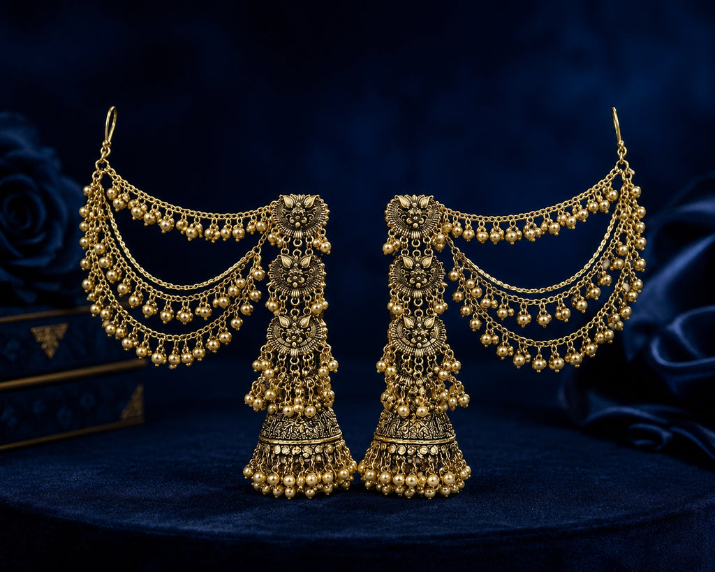 Antique gold bugadi chain jhumka earrings worn by model