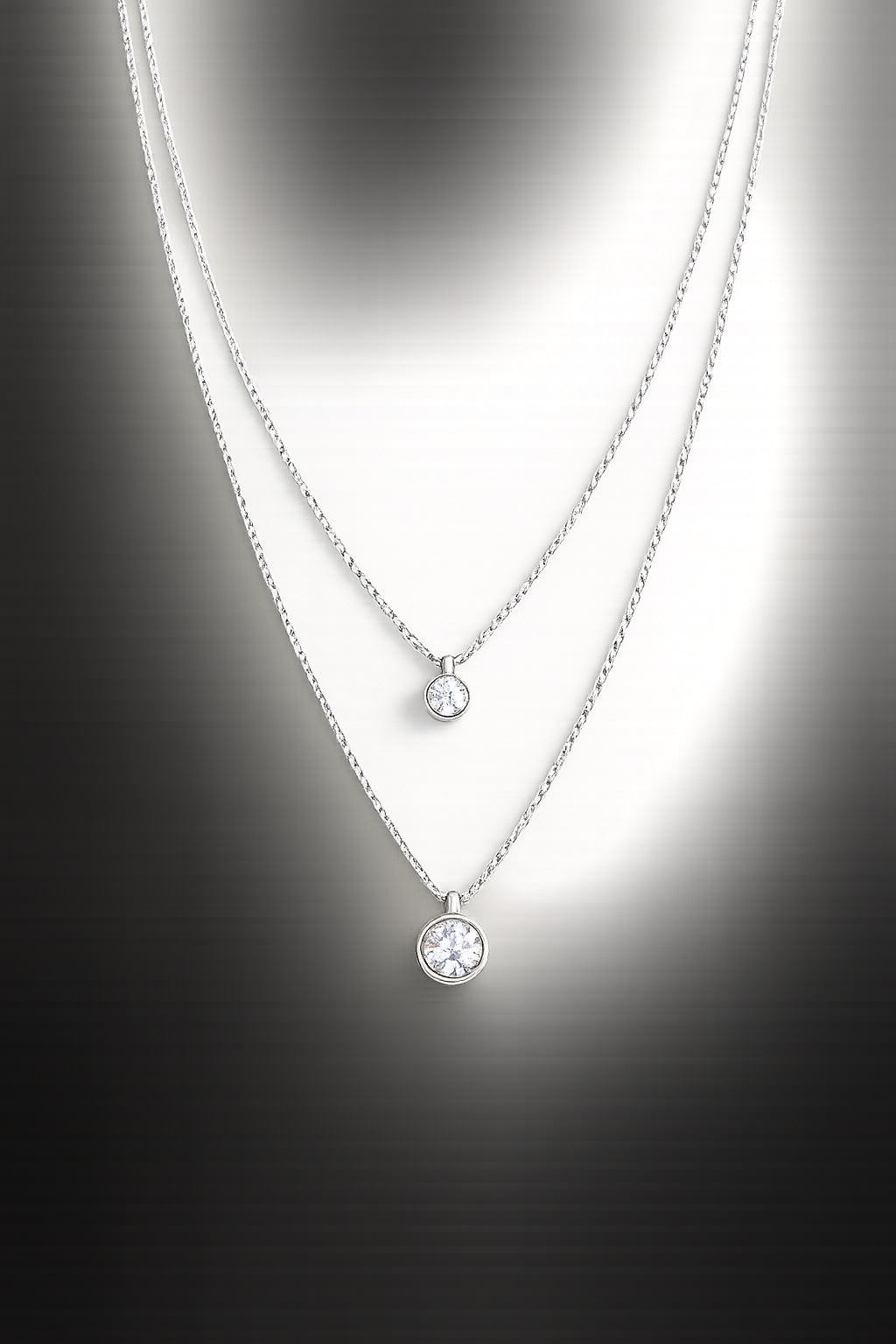 Velvet Petals silver layered CZ bezel pendant necklace on grey gradient background
